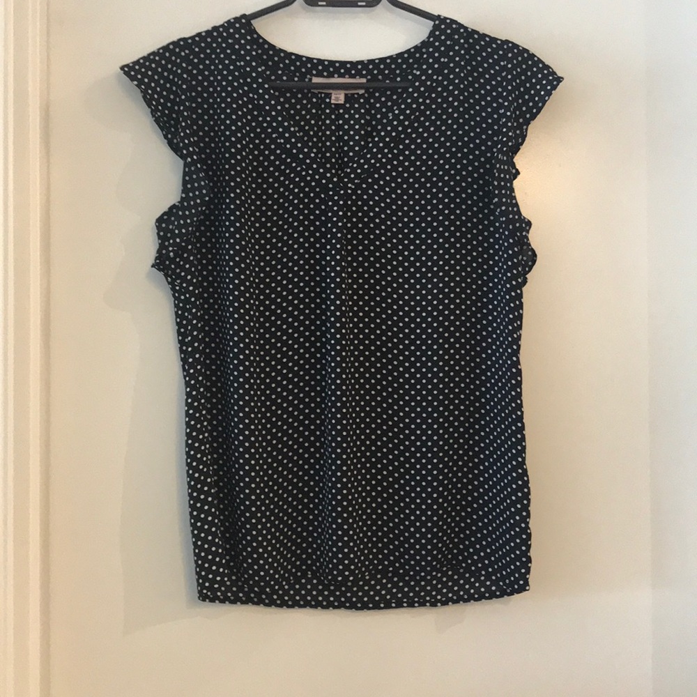 Sleeveless polka dot blouse